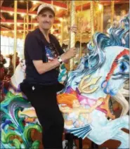  ?? EVAN BRANDT — MEDIANEWS GROUP ?? Carousels aren’t just for kids. Edward Sakiewicz Jr. of Pottstown was looking forward to taking a ride on the Hippocampu­s, the newest and last fantastic beast to be added to the Carousel at Pottstown.