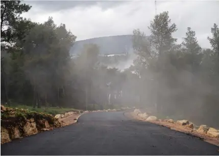  ?? ?? FOG IN the Upper Galilee blankets one of the new roads the IDF built to help people access communitie­s threatened by Hezbollah.
