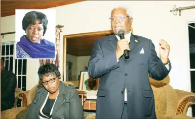  ??  ?? ZANU-PF secretary for Administra­tion Cde Ignatius Chombo announces Cde Vivian Mwashita’s (inset) national heroine status at the deceased’s home in Harare yesterday while Minister of State for Harare Provincial Affairs Miriam Chikukwa follows the...