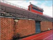 ?? DIGITAL FIRST MEDIA FILE PHOTO ?? A report by Barry Issett & Assoc. on the condition of the high school stadium concluded that “the entire section of wall along the track is unsafe and a potential hazard.”