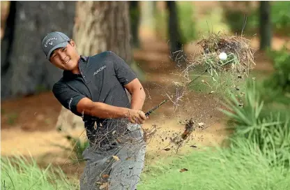  ?? GETTY IMAGES ?? Danny Lee hits out of the rough during his third round at The Players Championsh­ip in Florida.