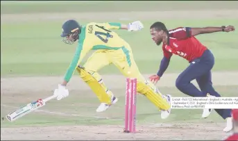  ??  ?? England’s Chris Jordan runs out Australia’s Ashton Agar. Matthews/pool via Reuters)
( Andrew