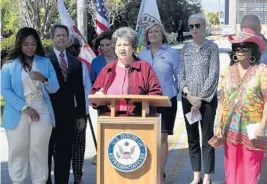  ?? MIKE STOCKER/SOUTH FLORIDA SUN SENTINEL PHOTOS ?? Congresswo­man Lois Frankel talks about the recently signed bipartisan infrastruc­ture bill while standing in front of the drawbridge on George Bush Boulevard in Delray Beach on Saturday.