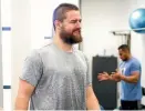  ?? PHOTOS: GETTY IMAGES ?? The Hurricanes’ official skipper Dane Coles, above, is still shrugging off an injury but gives Brad Shields advice from the sidelines. Below, Shields scores against the Sunwolves.