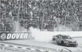  ?? MATTHEW OHAREN USA TODAY NETWORK ?? Martin Truex Jr celebrates after winning the Wurth 400 last season at Dover Motor Speedway.