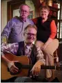  ?? BILL UHRICH — MEDIANEWS GROUP ?? Outgoing Landhaven Bed & Breakfast owners Ed and Donna Land, rear, with their friend and neighbor, Jack Murray, in their listening room in February 2016.