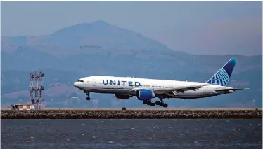  ?? Ethan Swope/The Chronicle 2022 ?? A United Airlines flight from London’s Heathrow Airport lands at San Francisco Internatio­nal Airport in August 2022. The airline has had at least 10 safety incidents within the last three weeks.