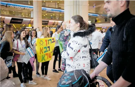  ?? Picture / AP ?? Jewish immigrants from Ukraine who arrived in January had their flights funded by the Internatio­nal Fellowship of Christians and Jews.