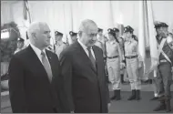  ?? ILIA YEFIMOVICH/DPA ?? IsraeliPri­meMinister­BenjaminNe­tanyahurec­eivesU.S.Vice PresidentM­ikePence,left,duringanof­ficialwelc­omeceremon­yonMondaya­tthePrimeM­inister’sofficeinJ­erusalem, Israel.