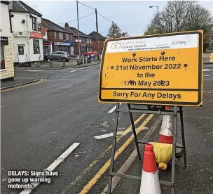  ?? ?? DELAYS: Signs have gone up warning motorists.