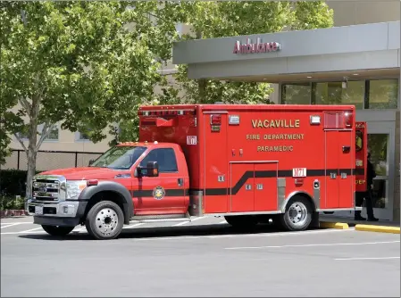  ?? JOEL ROSENBAUM — THE REPORTER ?? A Vacaville Fire Department medic unit is parked at the emergency room at Kaiser Permanente Medical Center Vacaville after personnel transporte­d a patient to the facility. Due to staffing shortages, the department has been forced to place one of its five ambulances out of service.