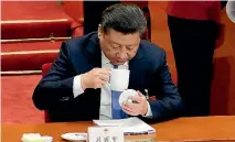  ?? JASON LEE/REUTERS ?? Like millions of Chinese, President Xi Jinping enjoys a refreshing cup of tea and many of them are adding cream cheese to their brews.