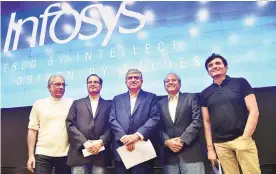  ?? PHOTO: PTI ?? Newly appointed Non-Executive Chairman of Infosys Nandan Nilekani (centre) with board members ( from left) Ravi Venkatesan, CEO Pravin Rao, D N Prahlad and CFO Ranganath D Mavinakere during a press conference in Bengaluru on Friday