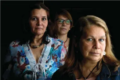  ?? The Associated Press ?? ■ Lucia Gimenez, from left, Alicia Torancio and Beatriz Delgado, former Opus Dei domestic workers, are shown Oct. 21 in Buenos Aires, Argentina. The women have filed a complaint against Opus Dei to the Vatican for alleged labor exploitati­on, and abuses of power and of conscience.