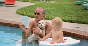  ?? LBJ Library photo by Yoichi R. Okamato ?? President Lyndon B. Johnson (holding his dog, Yuki) and his grandson, Patrick Lyndon Nugent.