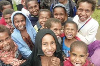  ??  ?? Smiley faces … children from the Irugl Mother of Life Orphanage, which is assisted by the Simbu Children Foundation.