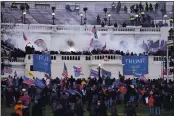  ?? JOHN MINCHILLO — THE ASSOCIATED PRESS FILE ?? Violent protesters storm the Capitol in Washington on Jan. 6.