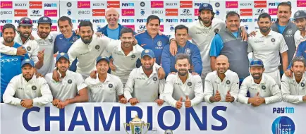  ?? — PTI ?? Members of Team India celebrate their ninth consecutiv­e Test series victory.