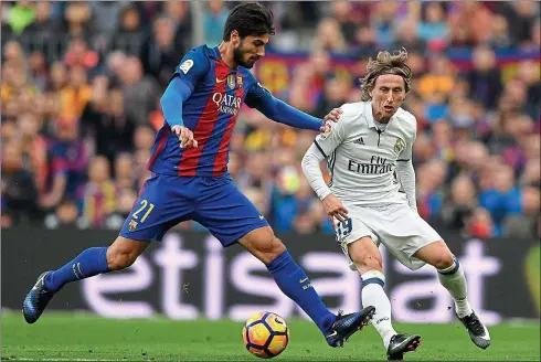  ??  ?? West Ham target: defensive midfielder Andre Gomes (left) has failed to hold down a place at Barcelona, who signed him for £31.5m in 2016