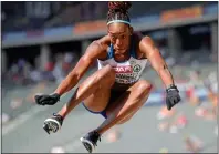  ??  ?? JUMP FOR JOY: Shara Proctor (above) won bronze in the long jump but Lorraine Ugen slumped in the final