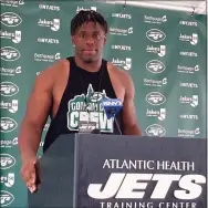  ?? Dennis Waszak / Associated Press ?? New York Jets defensive end Carl Lawson speaks to reporters at the team’s training camp facility in Florham Park, N.J., on Tuesday.