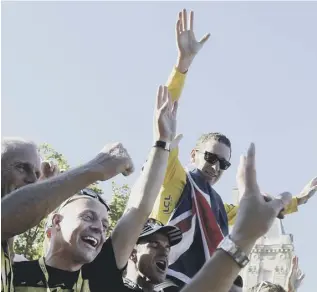  ??  ?? 0 Team Sky’s Dave Brailsford, second left, celebrates with Bradley Wiggins in 2012.