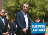  ?? JAE C. HONG/AP ?? California Gov. Gavin Newsom speaks Friday in Santa Monica. He signed a gun control measure that is patterned after the anti-abortion law currently in place in Texas.