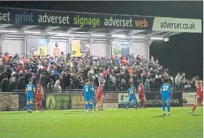  ?? ?? The Boro fans watch their team claim a 2-1 win to take third sport in the league table