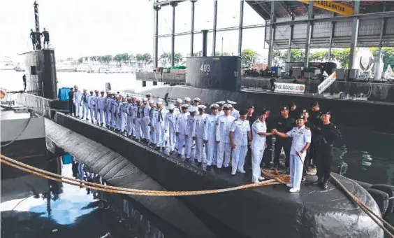 ??  ?? This 2019 picture shows the crew and officers of the missing submarine Nanggala in Surabaya, Indonesia. Picture: AFP Photo
