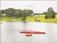  ?? Peter Casolino / Hearst Connecticu­t Media ?? The Travelers umbrella island off of the 16th tee at the TPC River Highlands in Cromwell.