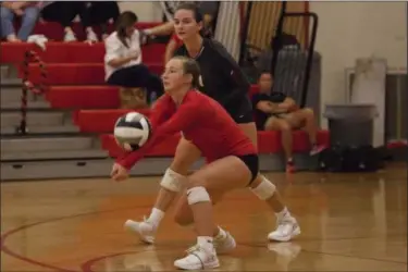  ?? JEN FORBUS — THE MORNING JOURNAL ?? Erin Comerford of Fairview digs the volleyball during the Warriors’ match against the Oberlin Phoenix October 8.