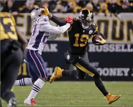  ?? DON WRIGHT — THE ASSOCIATED PRESS ?? Pittsburgh Steelers wide receiver JuJu Smith-Schuster (19) plays against the New England Patriots in a Dec. 16, 2018 game in Pittsburgh. Now he’s a member of the Patriots.