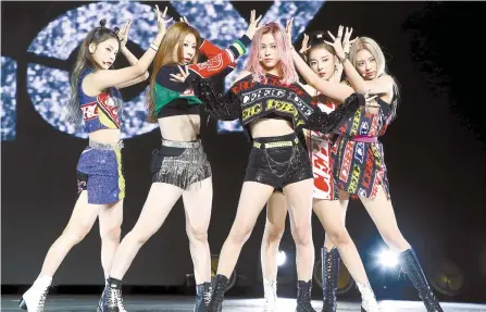  ?? Yonhap ?? ITZY, a rookie idol group, performs at Blue Square in Itaewon, Seoul, July 29.