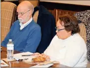  ?? / doug Walker ?? Northwest Georgia Housing Authority members Jim Keaten (left) and Hilda Curtis listen to concerns about some aspects of the Park Homes renovation work being cut from the budget.