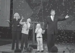  ??  ?? Stephen Harper celebrates his win on Jan. 23, 2006 with wife Laureen and kids Ben and Rachel.