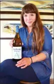  ?? STEVE MACNAULL/The Okanagan Weekend ?? Vin Amite co-owner Catherine Coulombe’s current favourite wine is the winery’s Chardonnay.