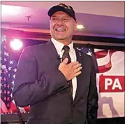  ?? CAROLYN KASTER / AP FILEº ?? State Sen. Doug Mastriano, R-Franklin, takes part in a primary night election gathering in Chambersbu­rg, Pa., on May 17.