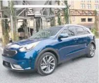  ??  ?? Billed as a sub-compact CUV, the 2017 Kia Niro hybrid is more a large compact with passenger and cargo volume to match.