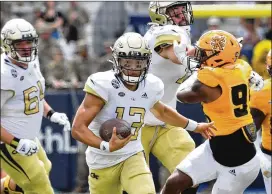  ?? HYOSUB SHIN/AJC 2021 ?? Quarterbac­k Jordan Yates threw for 254 yards and four touchdowns on 17-for-23 passing Saturday against Kennesaw State at Bobby Dodd Stadium.