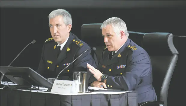  ?? SEAN KILPATRICK / THE CANADIAN PRESS ?? RCMP Deputy Commission­er Mark Flynn, left, and RCMP Commission­er Michael Duheme at the inquiry into foreign interferen­ce on Thursday.