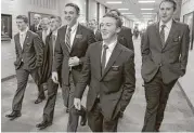  ?? Associated Press ?? Mormon missionari­es stroll through the halls at the Missionary Training Center in Provo, Utah.