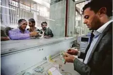  ?? Reuters ?? A currency exchange in Sana’a. The civil war has crushed the economy and pushed millions to the brink of starvation.