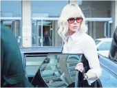  ?? JONATHAN PRIME ?? The stylish Lorraine Broughton (Charlize Theron) is a secret agent caught in a web of double-crossing in Atomic Blonde.