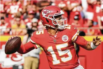  ?? Reed Hoffmann / Associated Press ?? Like many Texas natives, Kansas City QB Patrick Mahomes is a Whataburge­r fan.