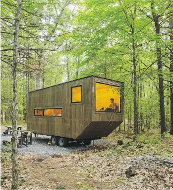  ?? RODERICK AICHINGER ?? Essentiall­y wooden cottages on wheels, tiny houses are becoming more popular.