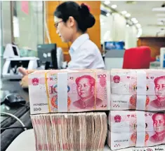  ??  ?? The yuan has weakened by 9pc on the greenback since April, the steepest fall in 25 years