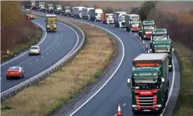  ?? Photograph: Neil Hall/EPA ?? Lorries queue during a test drive to the port of Dover in Kent to see how roads will cope in case of a no-deal Brexit, January 2019.