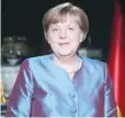  ?? — AFP ?? Merkel poses after recording her annual New Year’s speech.