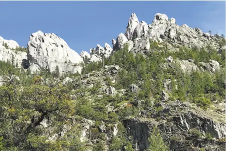  ?? Denese Stienstra / Special to The Chronicle ?? The upper crags above Castle Crags State Park, visible here from the Pacific Crest Trail, tower over I-5 in Northern California.