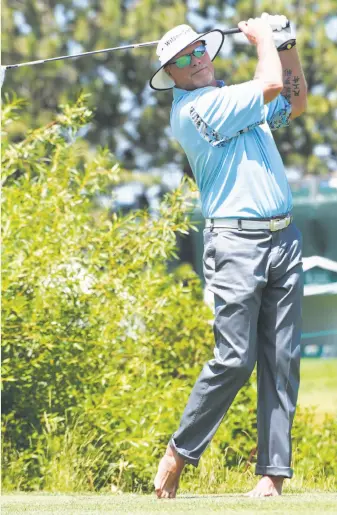  ?? Jeff Bayer/American Century Championsh­ip ?? Jim McMahon tees off during the opening round of the American Century Championsh­ip.